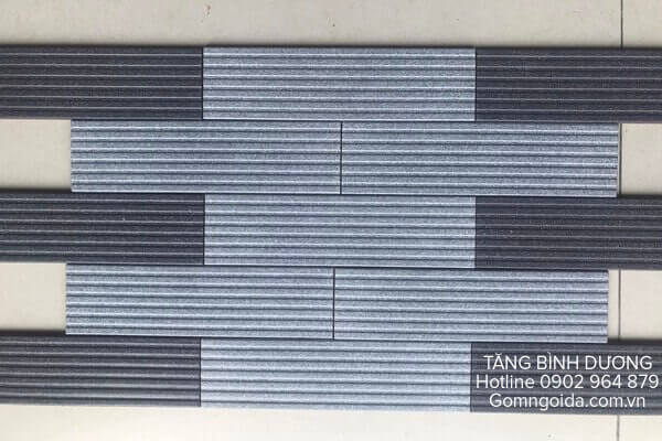 Gạch thẻ lượn sóng màu xám và đen - dòng gạch ốp tường trang trí phòng khách hottrend